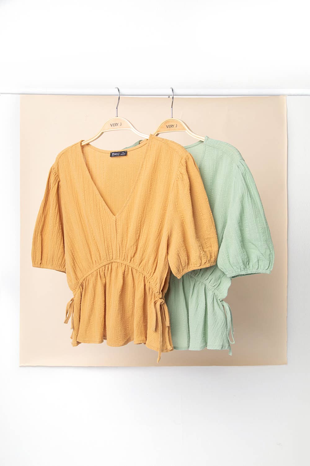 Crinkled V Neck Peplum Blouse